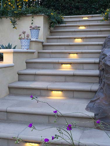 large white outdoor staircase with lights