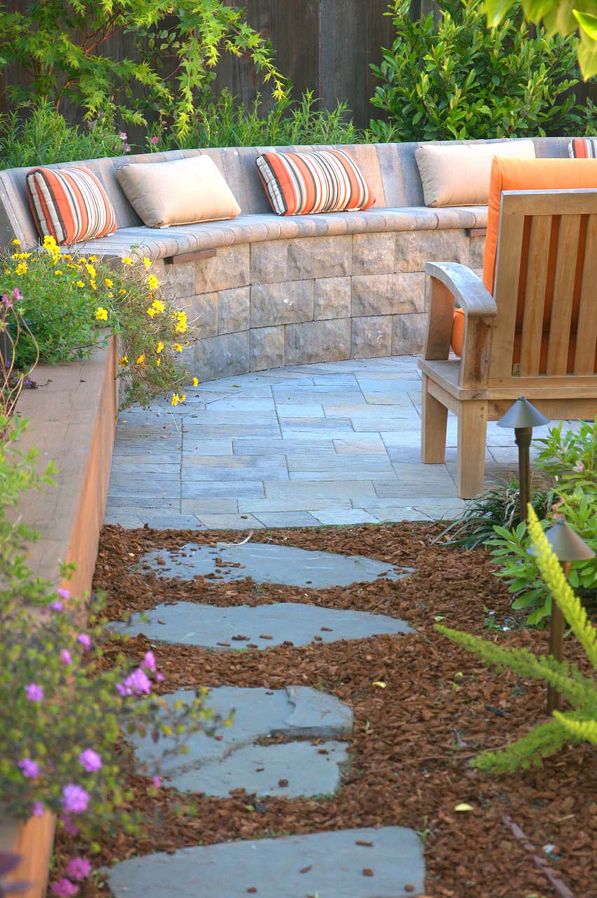 curved seating area made from stone pavers