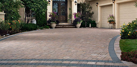 large curved luxury paver driveway