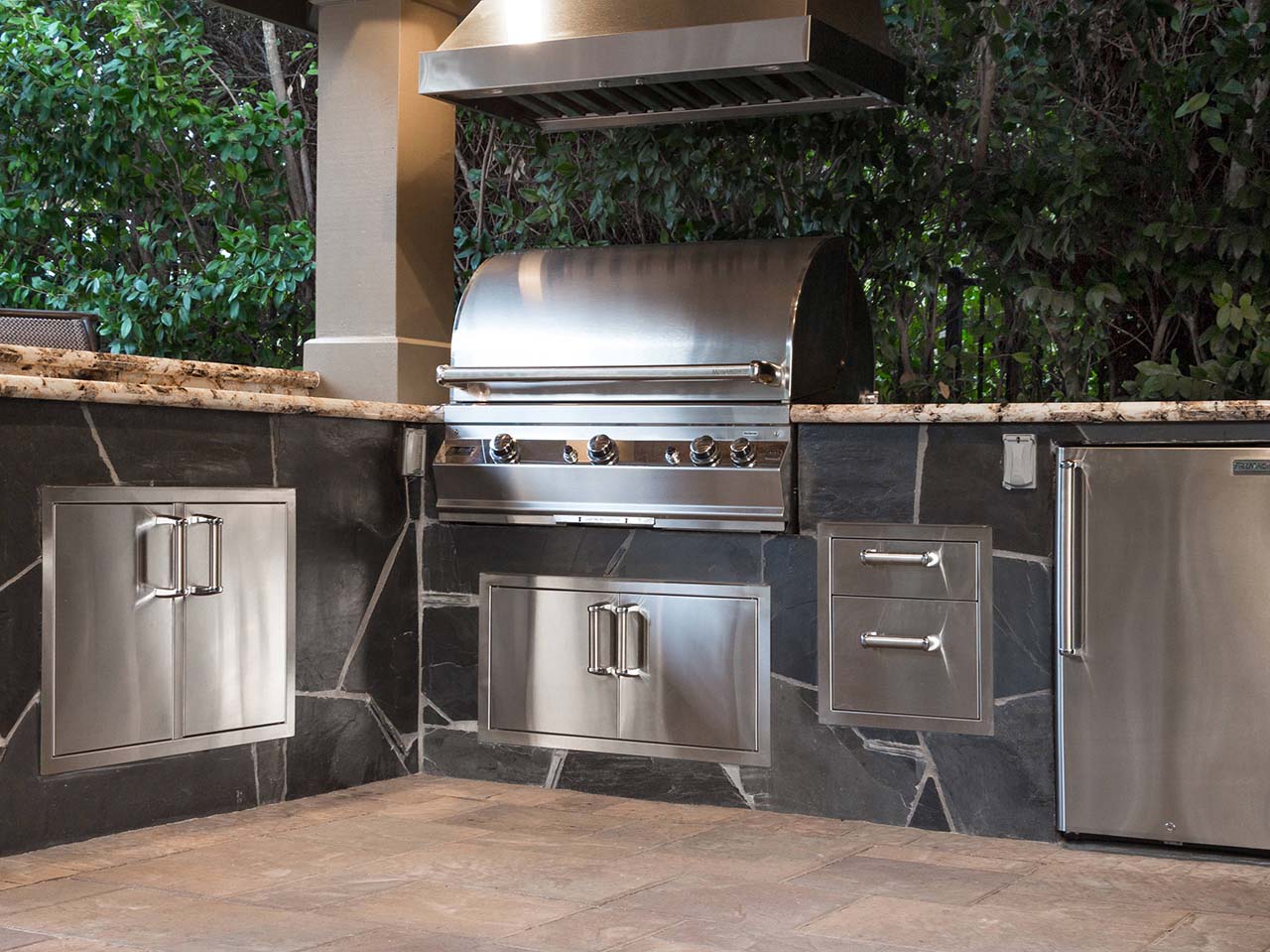 gray stone outdoor kitchen