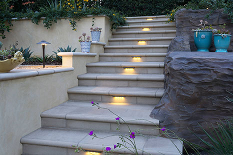 large paver stairway with lights