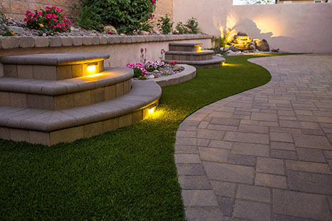 low paver steps in backyard for easy access to garden